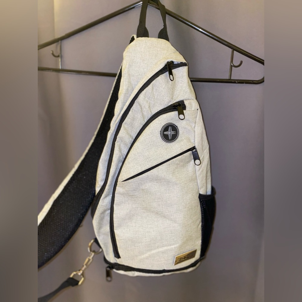 Grey cross body small back back bag